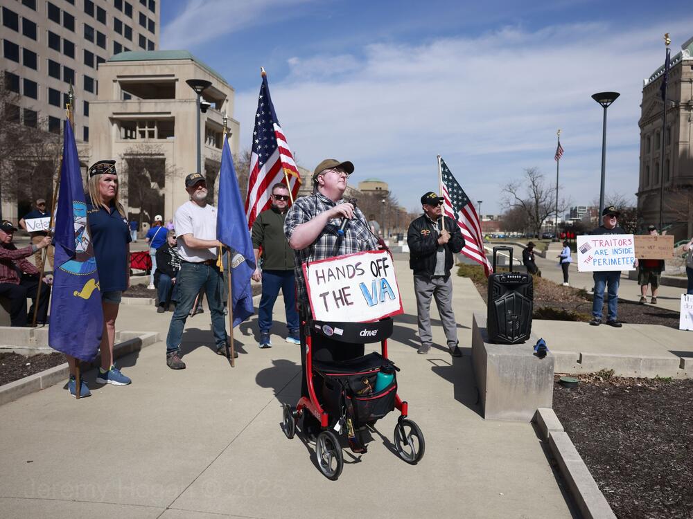 Protesters gather in Indianapolis on March 14. The Trump administration wants to cut 80,000 jobs from the Department of Veterans Affairs. The VA also funds medical and mental health research across the country.