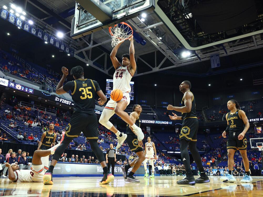 Dylan Cardwell #44 of the Auburn Tigers dunks the ball during the second half against the Alabama State Hornets in the first round of the NCAA Men's Basketball Tournament at Rupp Arena on March 20, 2025 in Lexington, Kentucky.