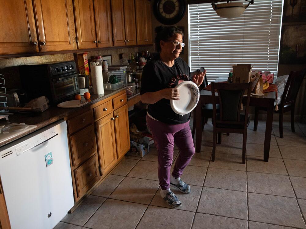 Irma Nunez helps her clients with eating, bathing, cleaning and other tasks, seven days a week.