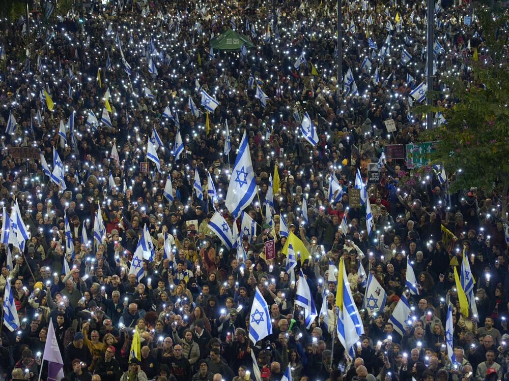 People take part in a protest demanding the immediate release of hostages held by Hamas in the Gaza Strip, in Tel Aviv, Israel, Saturday.