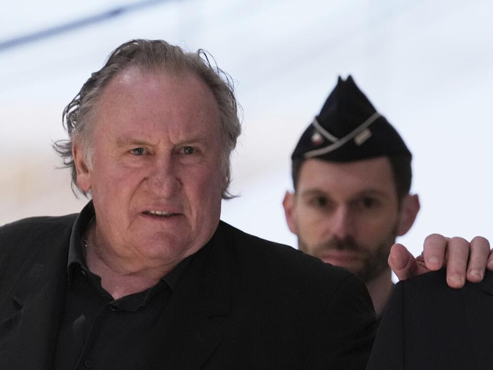 Actor Gerard Depardieu arrives to face trial for the alleged sexual assaults of two women on a film set in 2021 on Monday.
