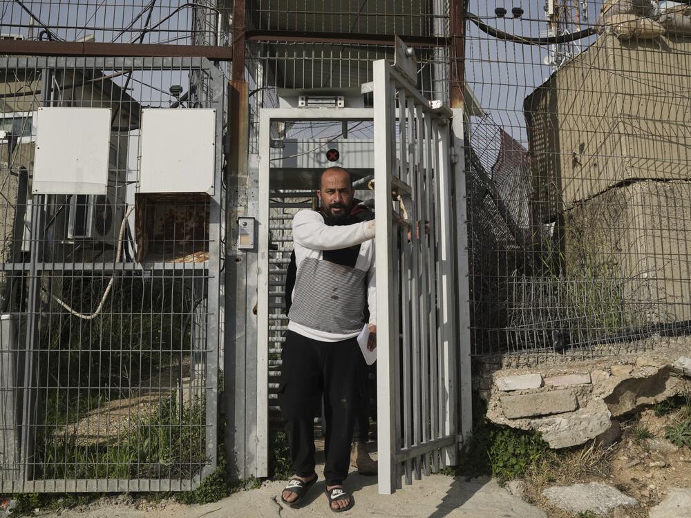 Hamdan Ballal, an Oscar-winning Palestinian co-director of <em>No Other Land</em>, is released from a police station in the West Bank settlement of Kiryat Arba on Tuesday, a day after being detained by the Israeli army following an attack by Jewish settlers.