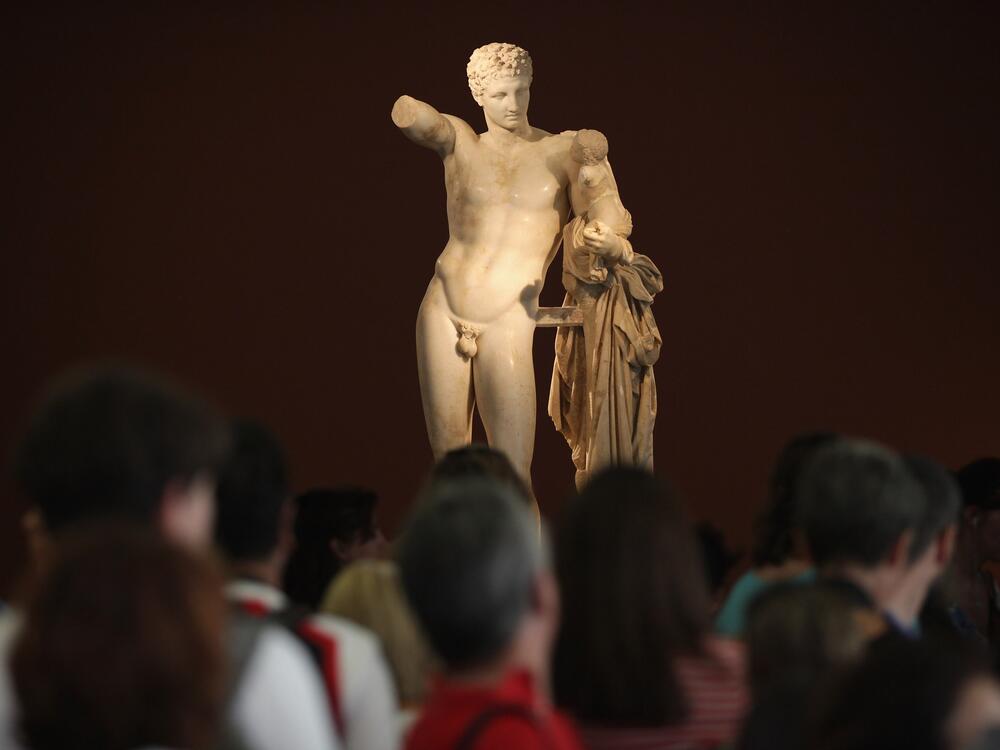 An ancient Greek statue of Hermes is displayed in the archeological museum in Olympia, Greece, in 2012.
