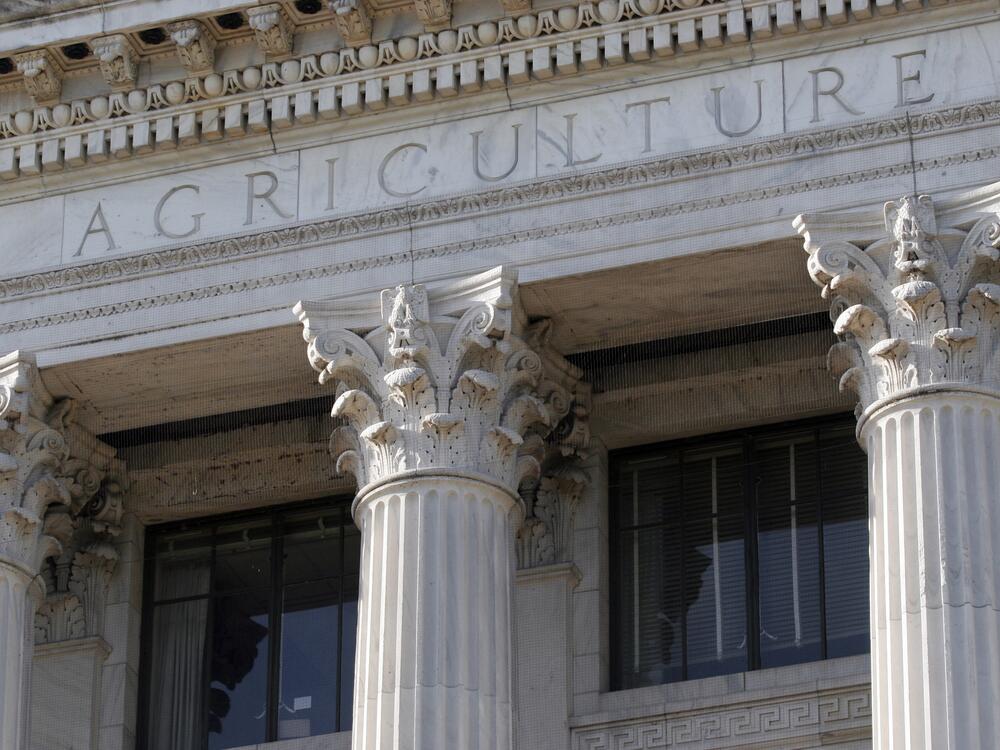 A 2007 file photo of the U.S. Department of Agriculture building in Washington, D.C. Federal employees returning to full-time in-person work say that there are not enough desks, internet connections aren't strong enough to support videoconferencing, and that even necessities like toilet paper can be in short supply.