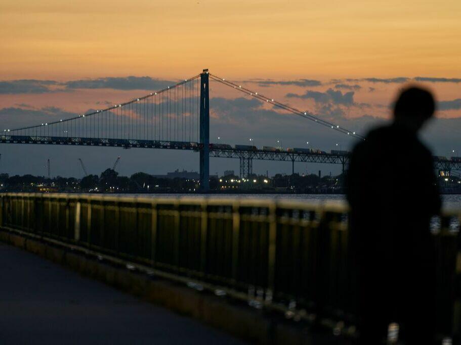 The Ambassador Bridge spans the Detroit River between Windsor, Ontario, and Detroit.
