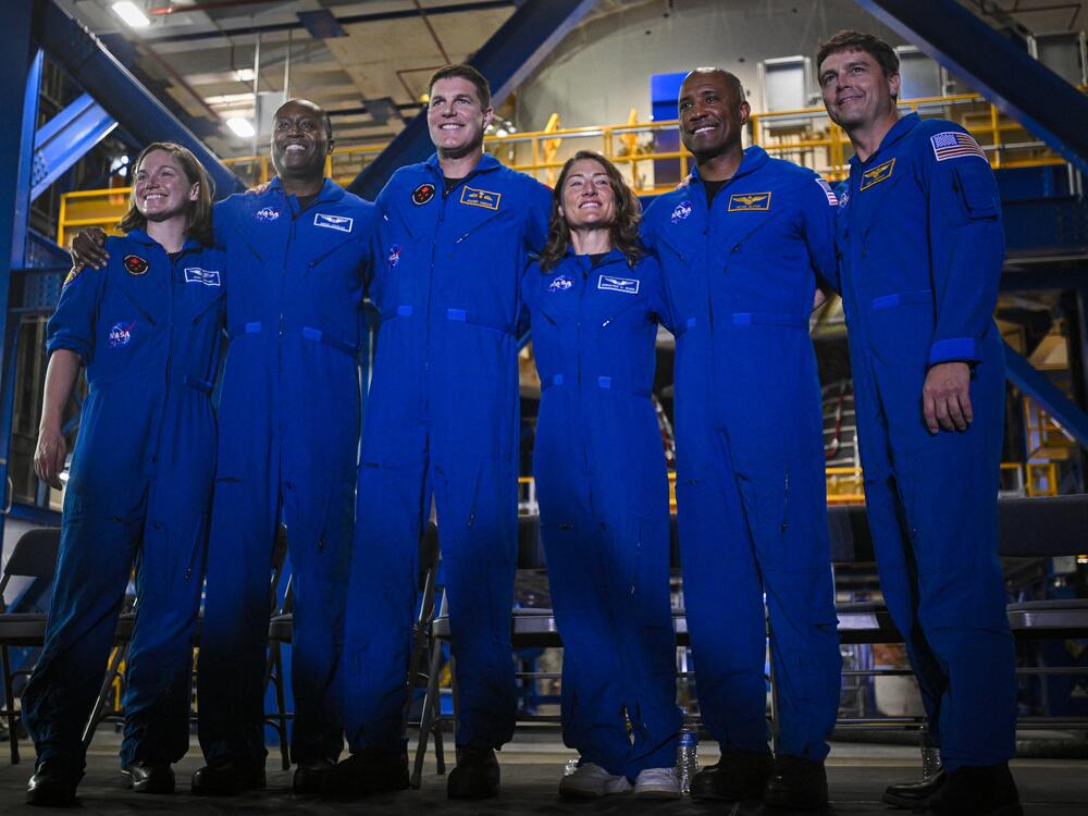 Next year's Artemis II crew includes Mission Specialist Jeremy Hansen, third from left; astronaut and Mission Specialist Christina Koch, fourth from left; astronaut and pilot Victor Glover, fifth from left; and astronaut and Commander Reid Wiseman, far right.
