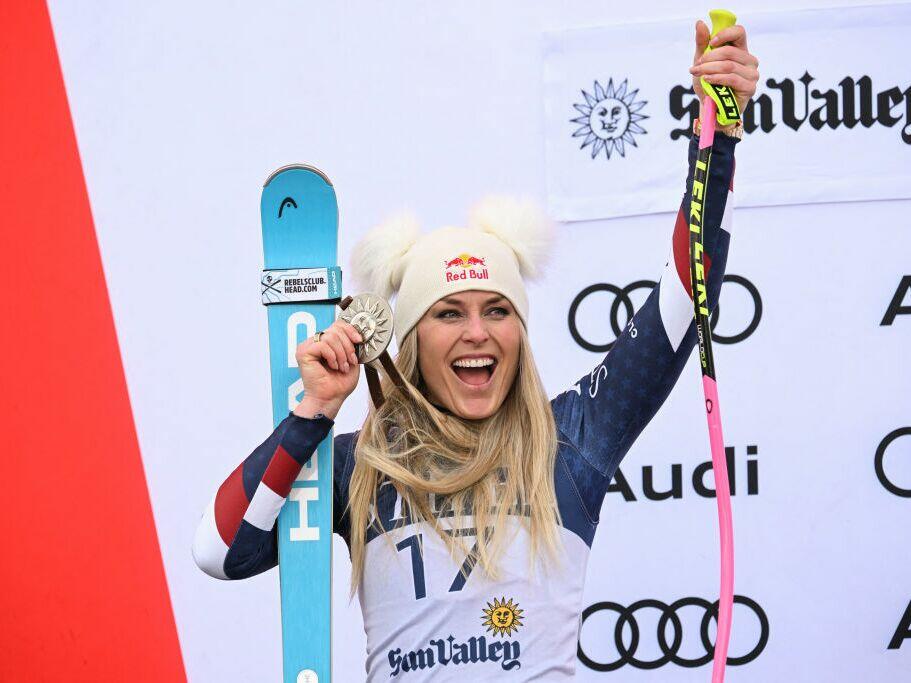 USA's Lindsey Vonn poses with her second place medal on the podium for the women's Super-G event at the Audi FIS Ski World Cup Sun Valley Finals in Sun Valley, Idaho on March 23, 2025.