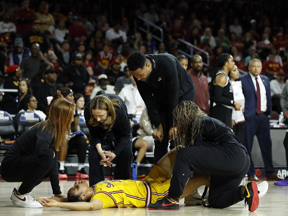 JuJu Watkins #12 of the USC Trojans after an injury against the Mississippi State Bulldogs in the first half during the second round of the NCAA Women's Basketball Tournament at Galen Center on March 24, 2025 in Los Angeles, California.