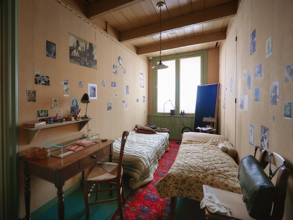 A replica of Anne Frank's bedroom that she shared with Fritz Pfeffer, a dentist in his 50s.