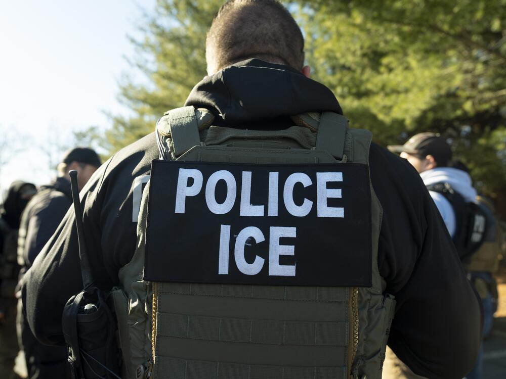 The director of U.S. Immigration and Customs Enforcement's Baltimore Field Office, Matt Elliston, listens during a briefing on Jan. 27 in Silver Spring, Maryland.