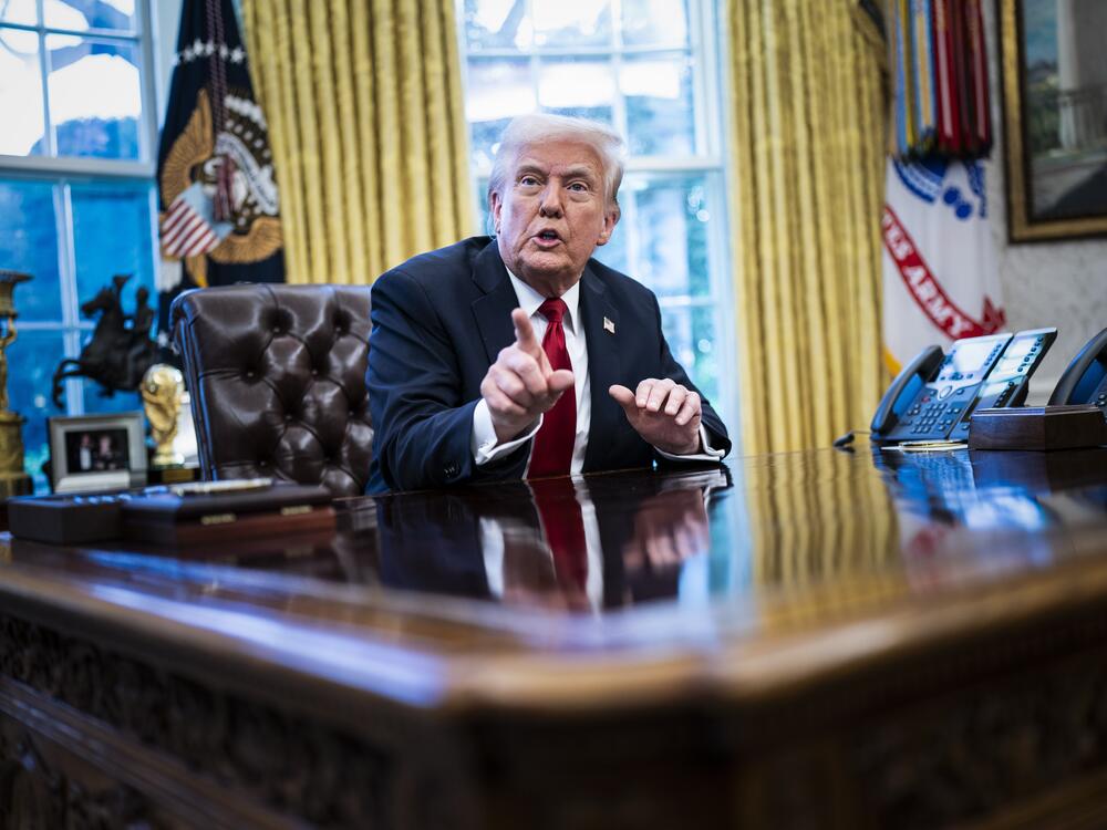 President Donald J Trump speaks to reporters about auto tariffs after signing an executive order in the Oval Office at the White House on March 26.