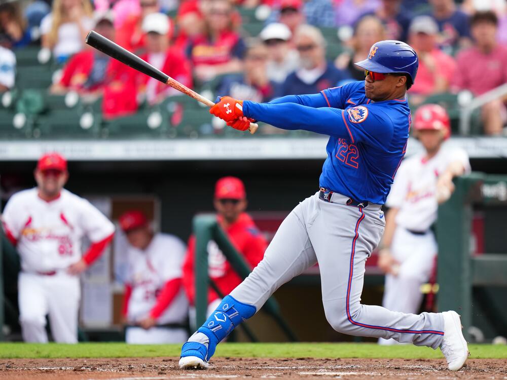 Juan Soto of the New York Mets hits a single against the St. Louis Cardinals at a spring training game on Feb. 24, 2025, in Jupiter, Fla.