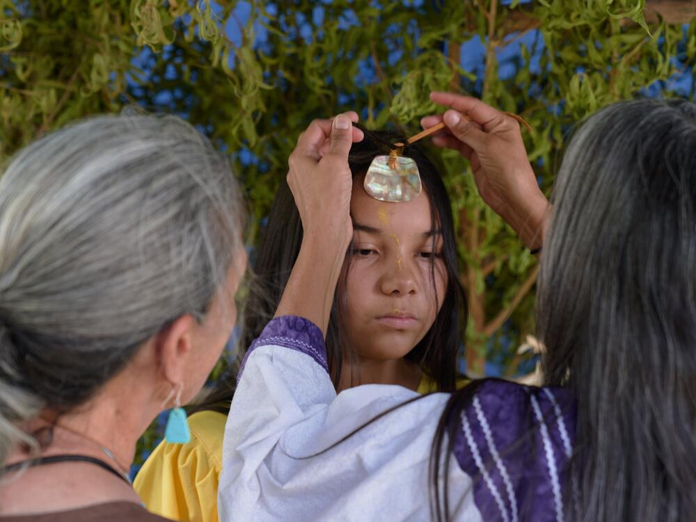 Ava dresses for the Apache Sunrise Dance.