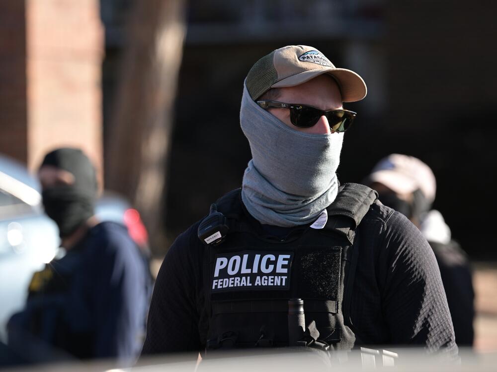 Federal law enforcement officers conduct an immigration enforcement operation at the Cedar Run Apartments in Denver, Colorado on Feb. 5, 2025.