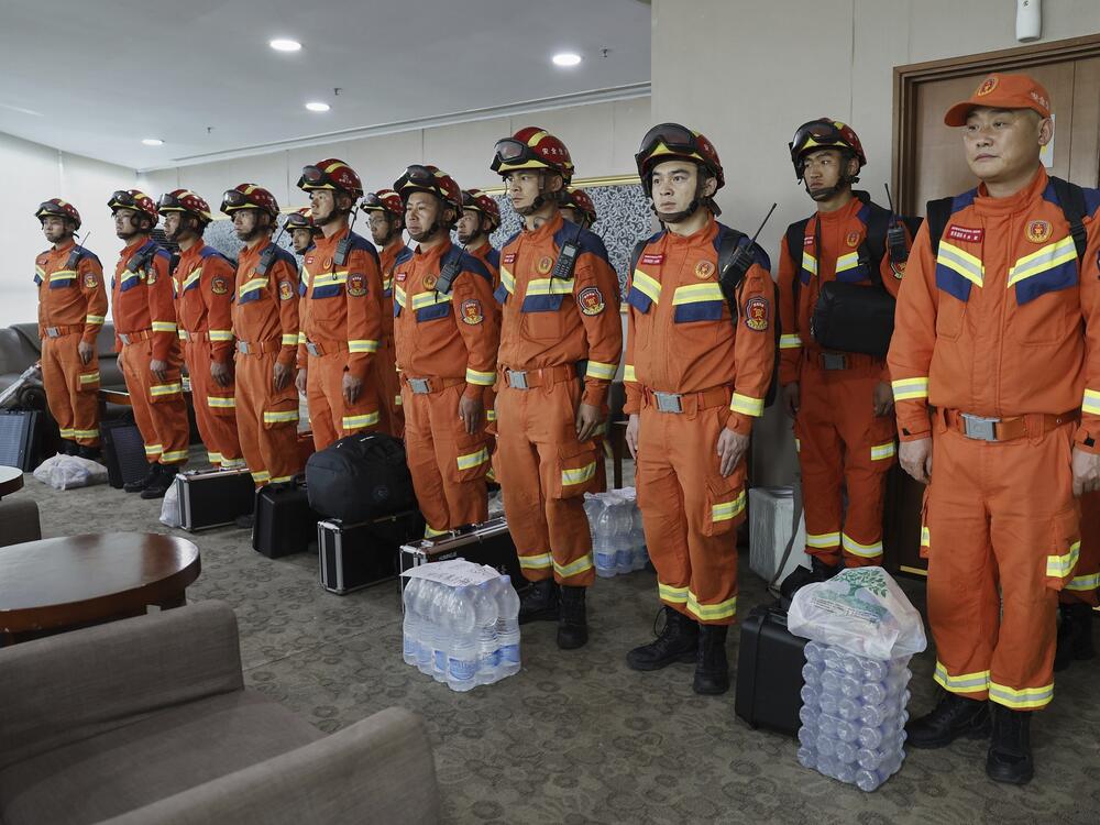 In this photo released by Xinhua News Agency, Chinese rescuers arrive at the Yangon International Airport in Yangon, Myanmar on Saturday, March 29, 2025.