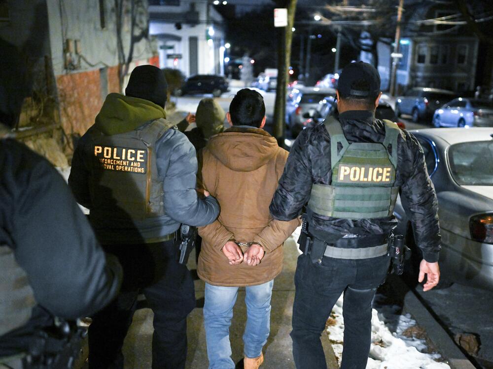 Law enforcement walk with Leonardo Fabian Cando Juntamay as he was detained in the Bronx during ICE-led operations to apprehend illegal immigrants on Jan. 28, 2025 in New York, NY.
