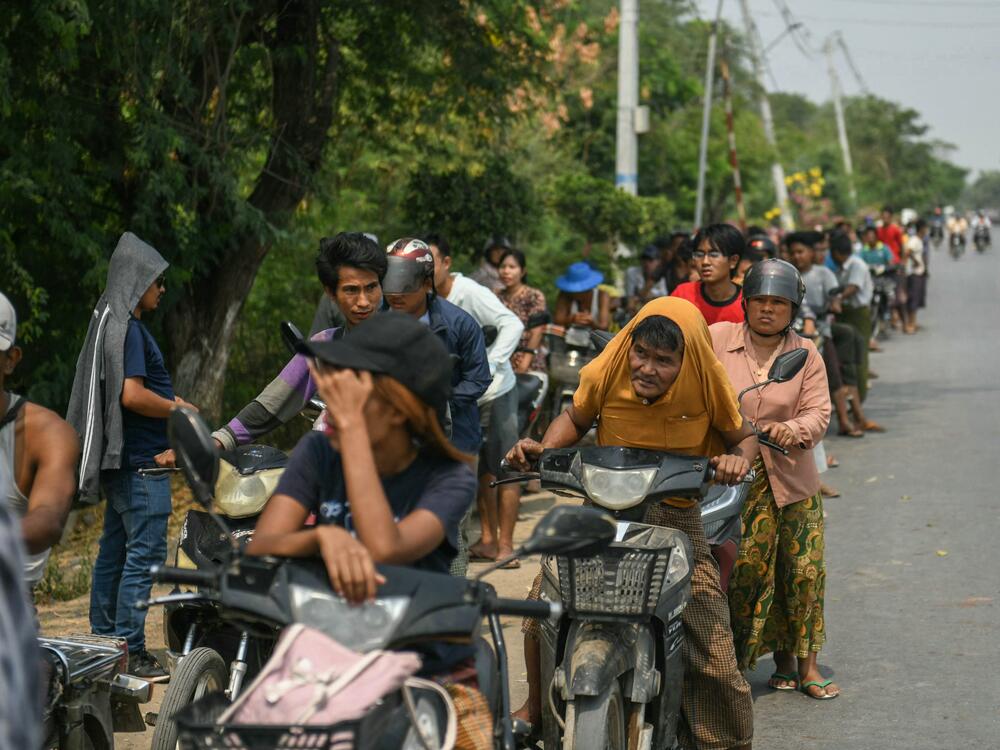 Motorists wait in line at a petrol station in Mandalay on March 29, 2025, a day after an earthquake struck central Myanmar.