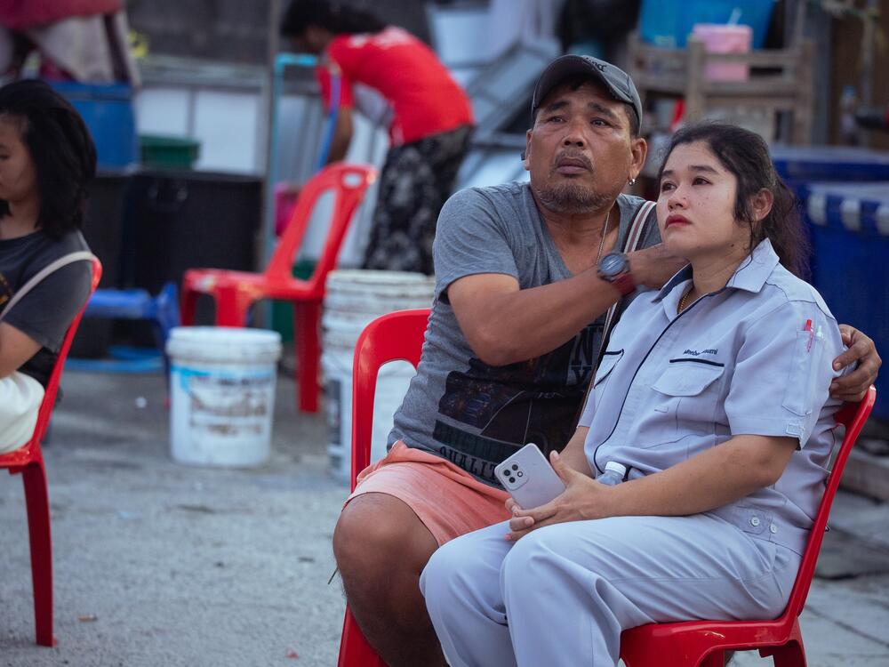 Members of the public anxiously wait for news on rescue operations at the Chatuchak skyscraper collapse site  on March 29, 2025 in Bangkok, Thailand.