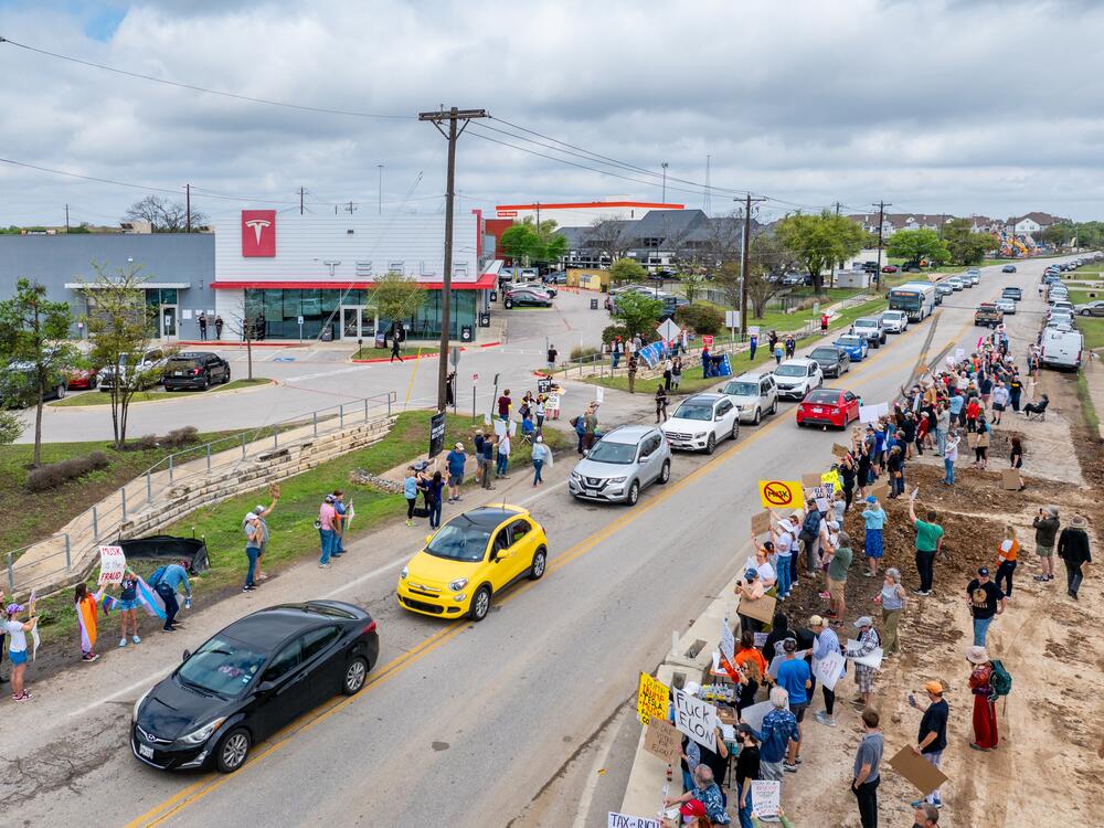 Protesters demonstrate against Tesla CEO Elon Musk's Department of Government Efficiency (DOGE) initiatives during a nationwide 