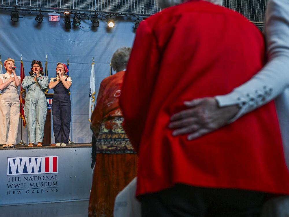The Victory Belles perform the national anthem during the Rosie the Riveter Congressional Gold Medal Commemoration at the World War II Museum in New Orleans, La.