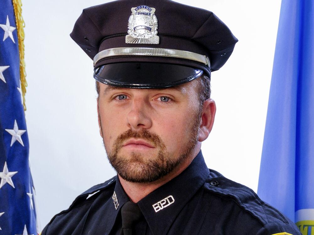 A photograph from the Boston Police Department shows Officer John O'Keefe of Canton, Mass., who was found dead outside the home of a fellow officer in January 2022.