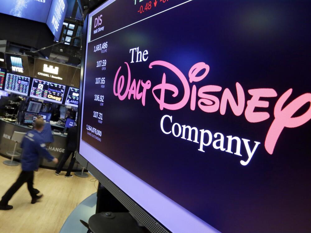 The Walt Disney Co. logo appears on a screen above the floor of the New York Stock Exchange on Aug. 8, 2017.