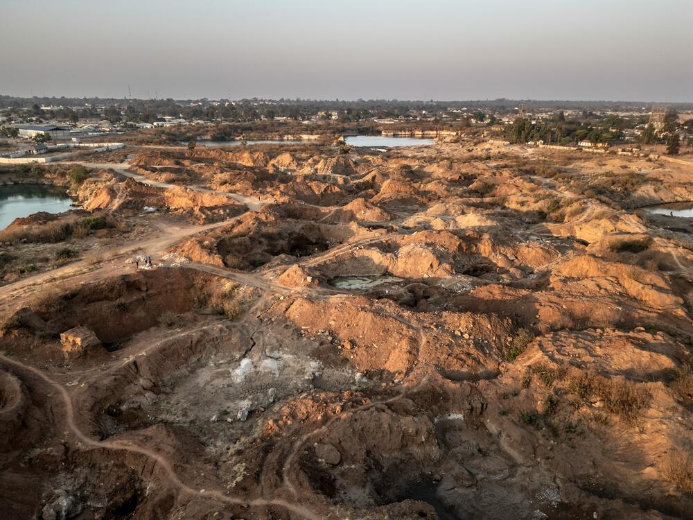 The site of a former lead and zinc mine in Kabwe, Zambia. Thirty years after the closure of the mine, the land remains highly contaminated — and artisanal miners continue to work here, exposing themselves daily to dangerously high levels of lead.