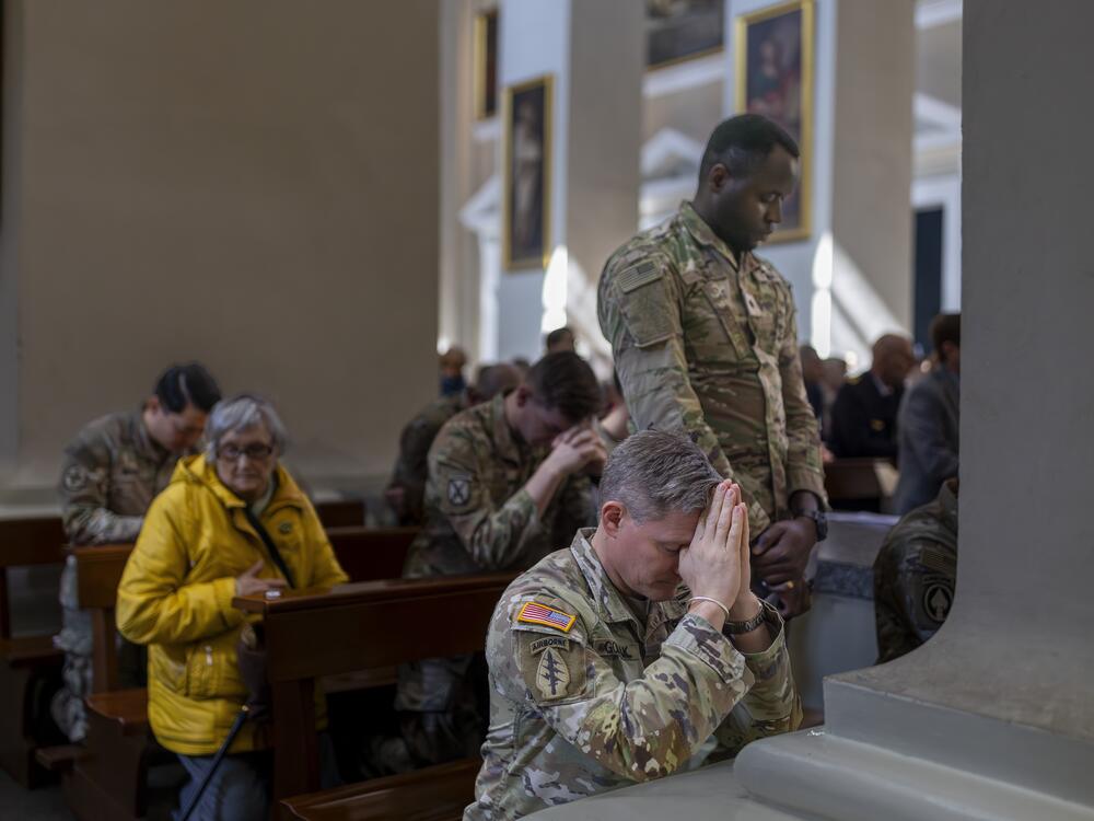 U.S. soldiers attend a Holy Mass at the Cathedral Basilica in Vilnius, Lithuania, on Sunday, for the four U.S. soldiers who went missing.