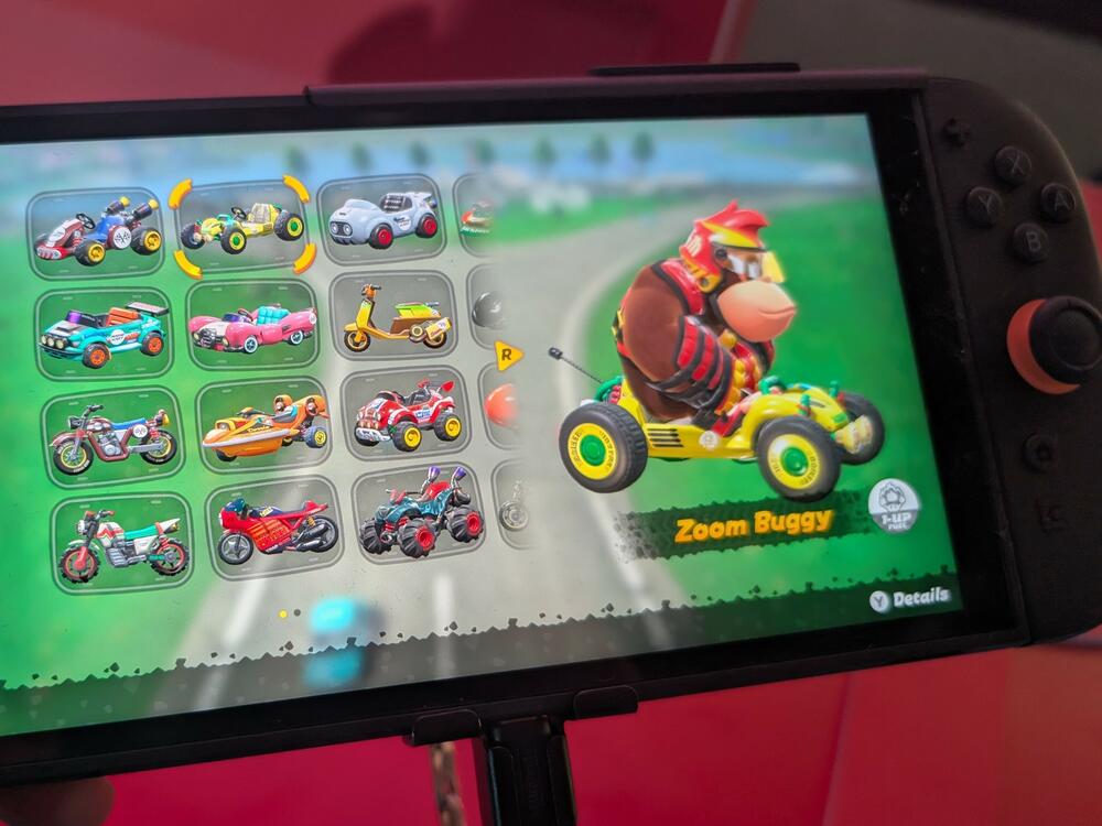 A Nintendo Switch 2 console playing Mario Kart World at a hands-on event in New York City.