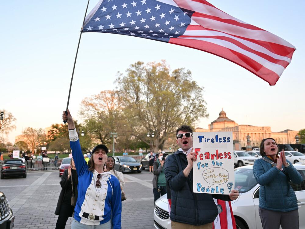 Supporters of Sen. Cory Booker gather outside the Capitol as he speaks on the Senate floor on Tuesday.