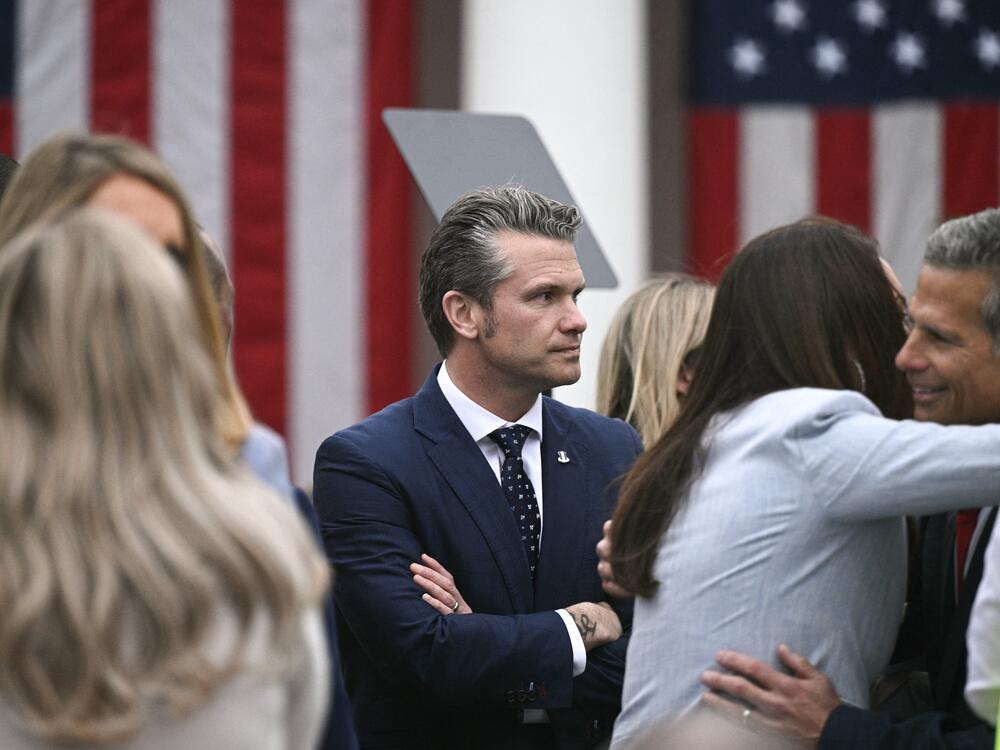 Secretary of Defense Pete Hegseth attends a tariff announcement in the Rose Garden on Wednesday. A Defense Department inspector general has announced he will review Hegseth's use of the Signal messaging app to discuss a military attack on Yemen.