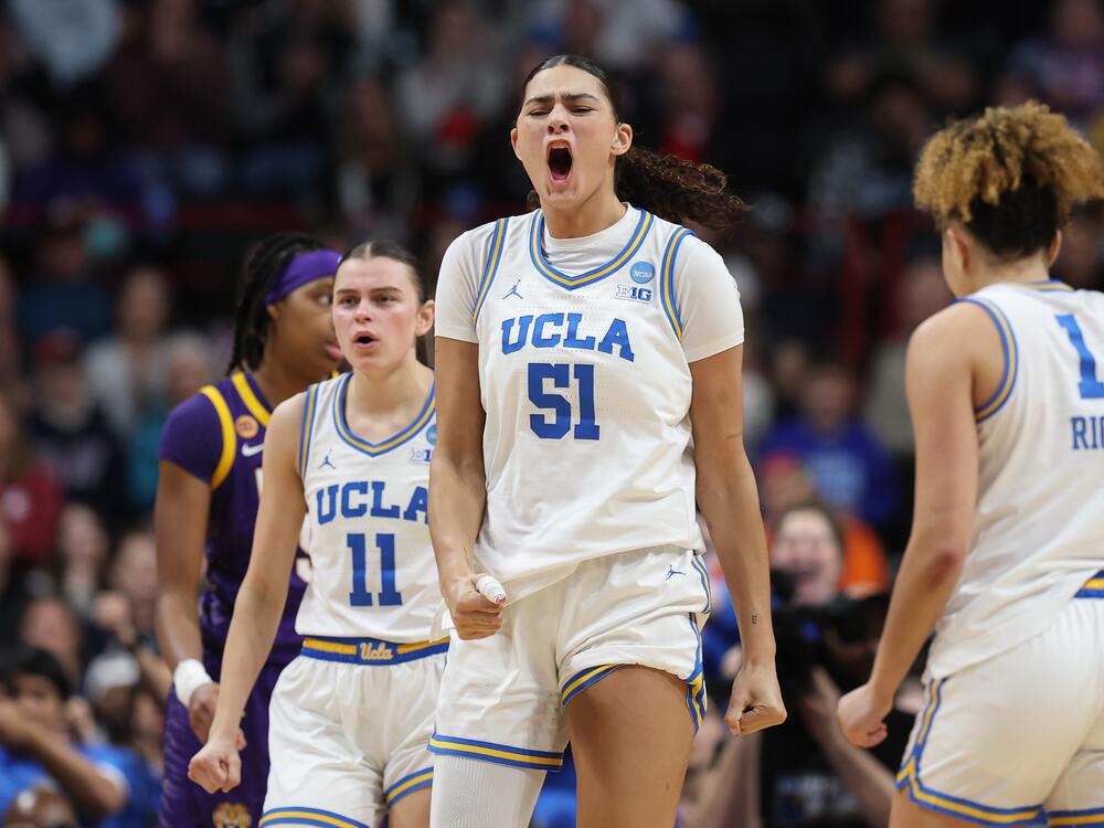 Lauren Betts (#51) reacts as her UCLA Bruins downed LSU to reach their first-ever Final Four. The 6-foot-7 junior is a tough matchup for any team and she's averaged 20 points and 9.6 rebounds per game this year.