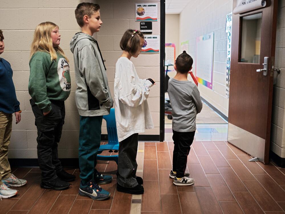 Kellen Hedler leads his fellow classmates at Frontier Elementary School near Oklahoma City. Kellen has Down syndrome, a genetic condition that causes a range of physical and developmental challenges.