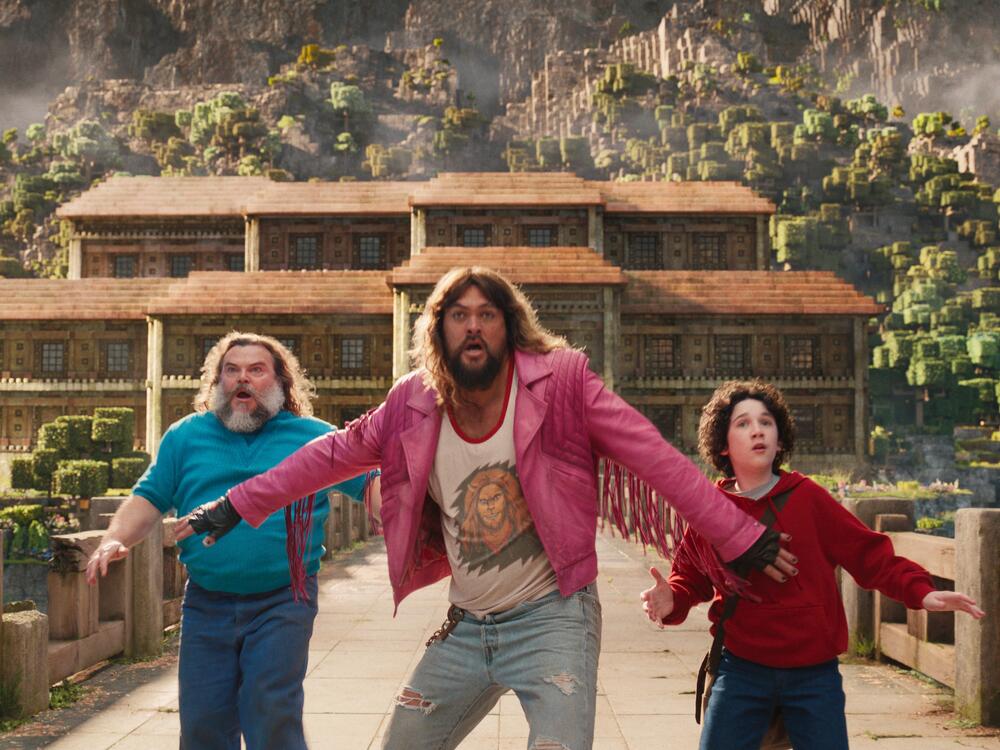 Jack Black as Steve, Jason Momoa as Garrett and Sebastian Hansen as Henry in <em>A Minecraft Movie</em>, out Friday.