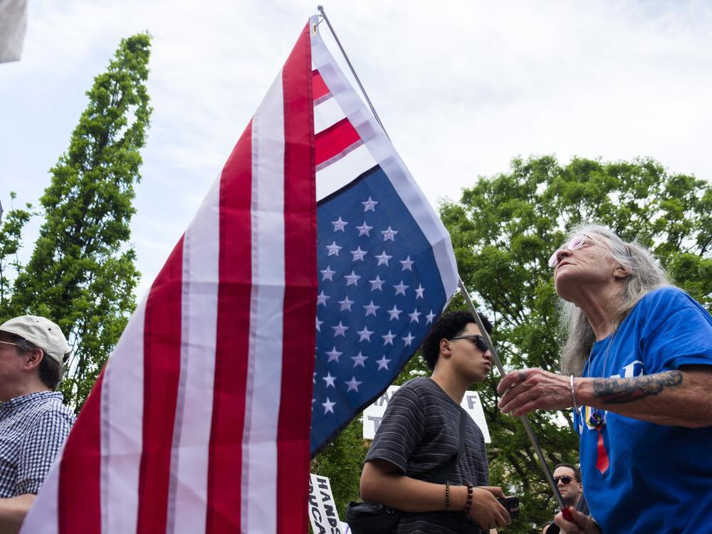 About 500 people from Macon, Ga, came together to protest the policies of President Trump.
