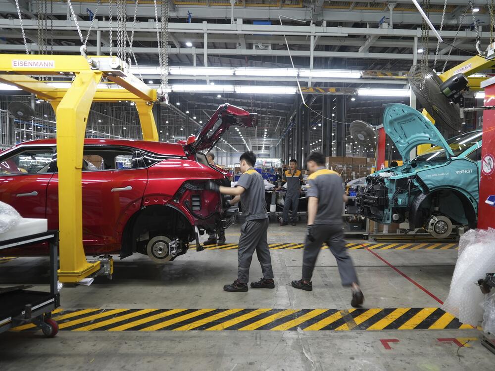 Workers assemble electric cars at a Vinfast factory in Hai Phong, Vietnam, on Sept. 29, 2023.