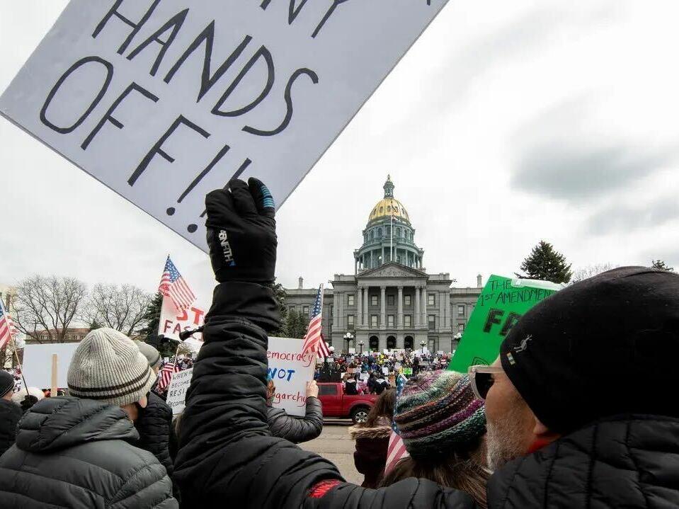 The peaceful rally included a march through parts of downtown Denver.