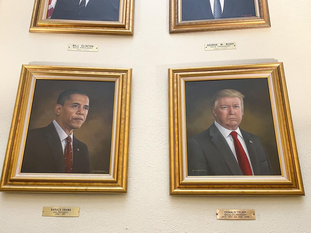 Portraits of President Donald Trump and former President Barack Obama, painted by artist Sarah Boardman, hang in the Capitol Rotunda in Denver last month. The Trump portrait has since been taken down.