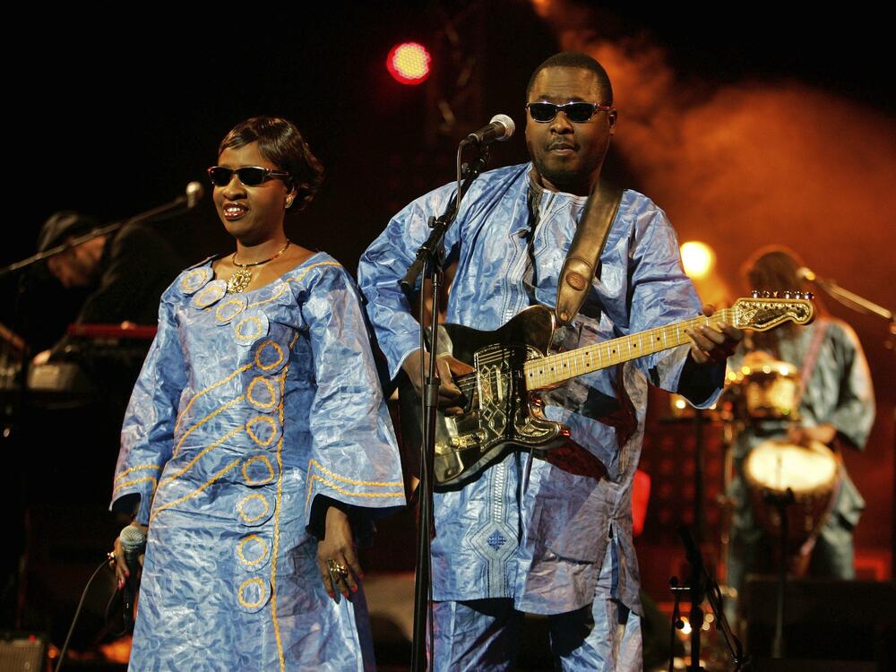 FILE - Blind duo from Mali, Amadou Bagayoko, right, and Mariam Doumbia, seen, during a concert in Paris, Monday, Dec. 1, 2008.