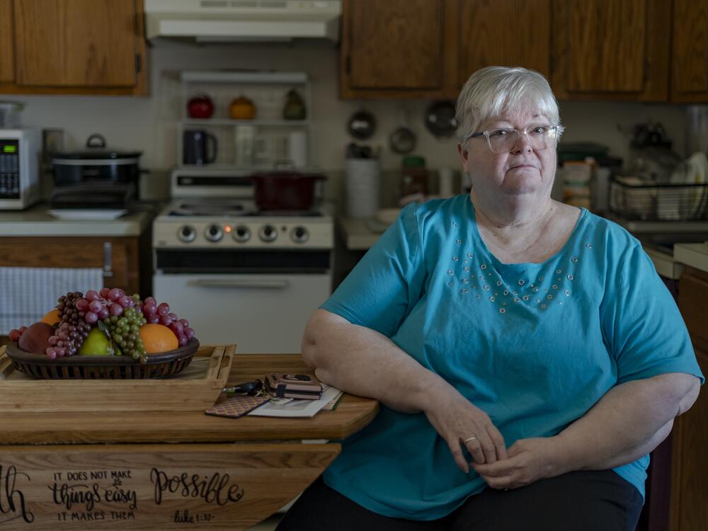 Linda Morgan on March 28 in her sister's apartment at Trinity Woods senior living in Emporia, Va., where they both live. The building's decades-old central air conditioning system died three years ago. 