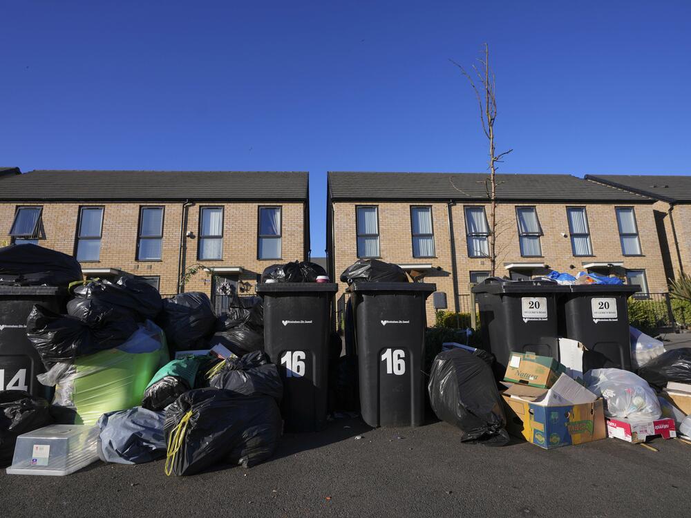 Rubbish piles up on a residential street in Birmingham, England on Monday amid an ongoing refuse workers' strike in the city.