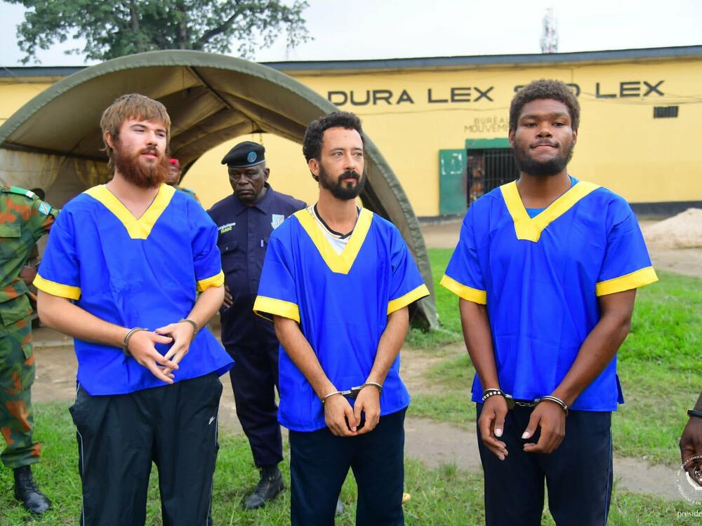 Left to right: Tyler Thompson Jr., Benjamin Reuben Zalman-Polun and Marcel Malanga upon their release from a Congolese prison.