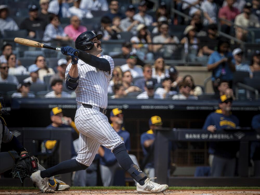 Austin Wells of the New York Yankees hits a home run in the first inning of the Yankees' game against the Milwaukee Brewers on March 29. The Yankees went on to win 20-9. Wells was using what some have dubbed a 