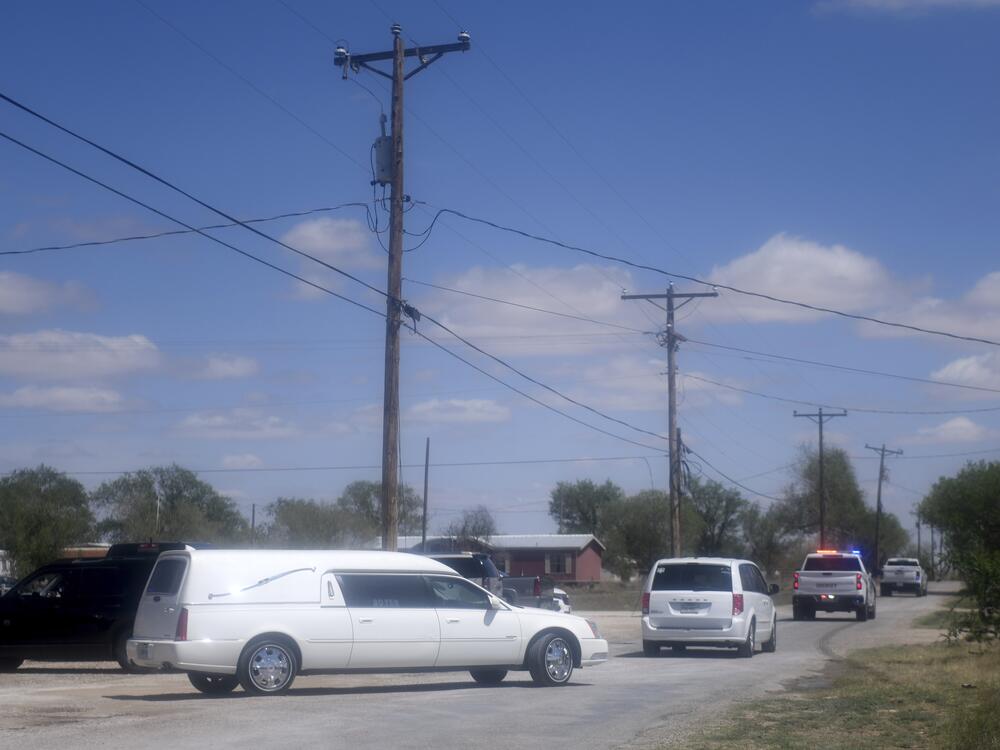 A funeral procession is seen after the second measles death in the state, Sunday, April 6, 2025, in Seminole, Texas.