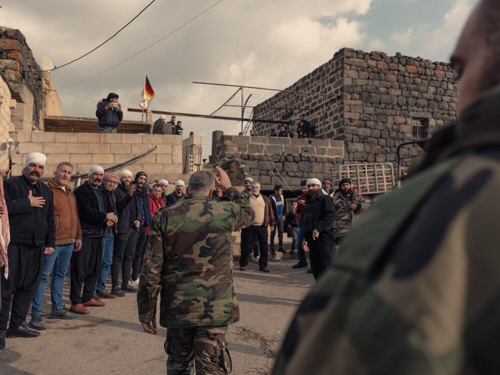 At a historic stone house in one of Sweida's southern villages, Tariq al-Shoufi and other commanders held a recruitment rally for new Sweida Military Council on March 8.