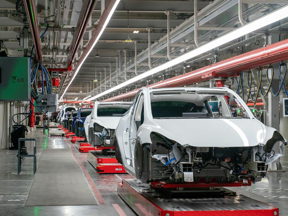 Cars on the Tesla assembly line at the Gigafactory Texas facility on April 7, 2022 in Austin, Texas. Teslas sold in the U.S. are all built in the U.S. But presidential advisor Peter Navarro insinuated this week that they weren't as 
