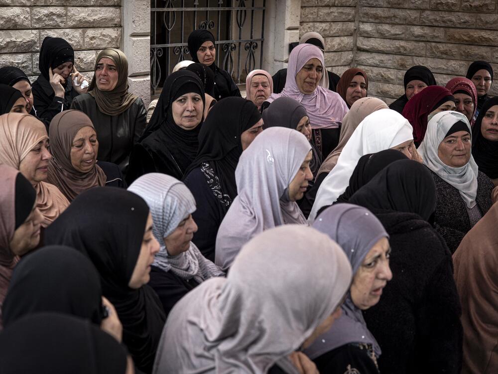 Mourners attend the funeral of 14-year-old Palestinian American Amir Rabee in the village of Turmus Ayya, in the Israeli-occupied West Bank, on Monday.