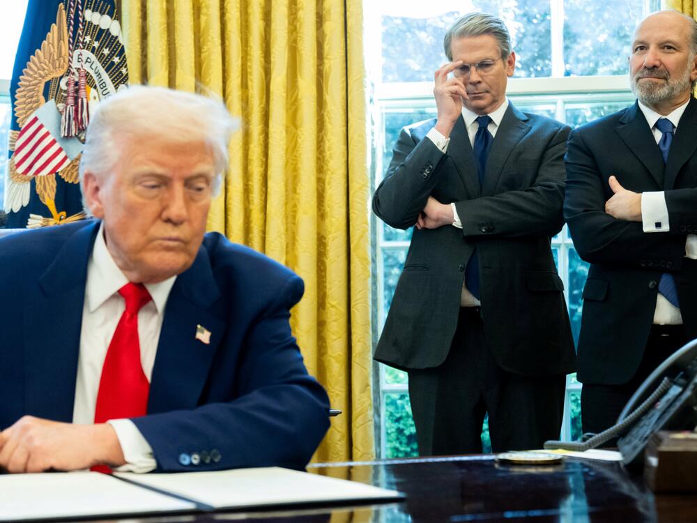 Treasury Secretary Scott Bessent and Commerce Secretary Howard Lutnick with President Trump in the Oval Office on Wednesday.