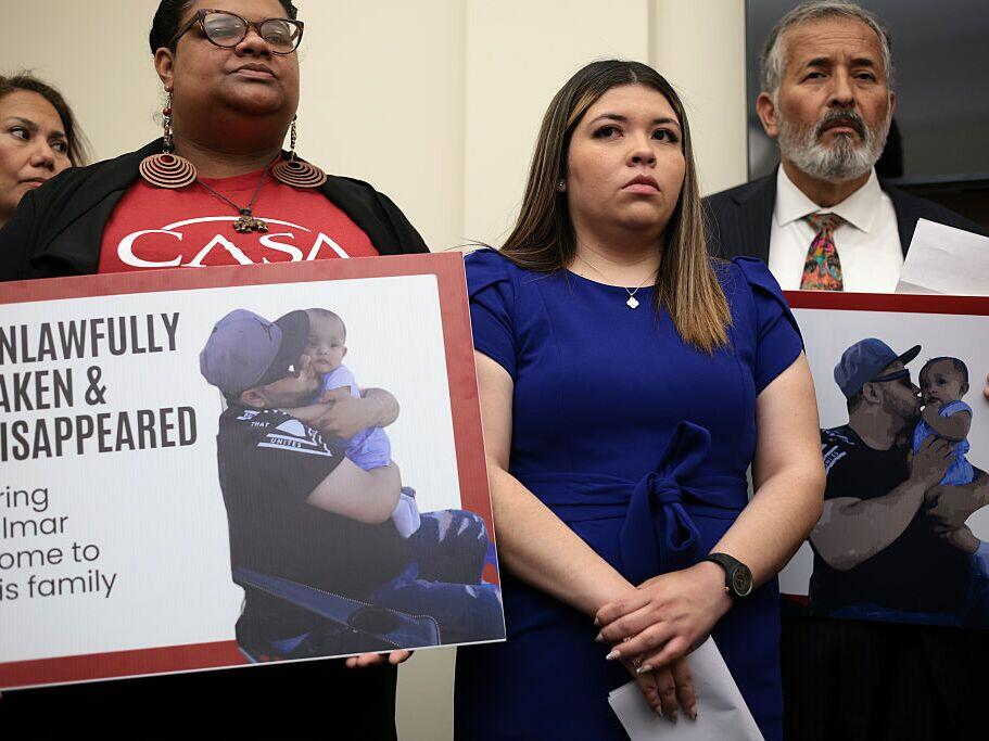 The wife of Kilmar Abrego Garcia, Jennifer Vasquez Sura (center), listens during a news conference to discuss her husband's arrest and deportation on Capitol Hill on April 9.