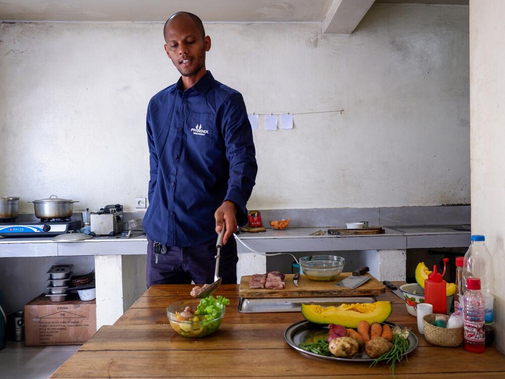 Chef Toky Razafimaharo, owner of the Phoenix Lounge in Antananarivo, prepares <em>lasopy soucril</em>.